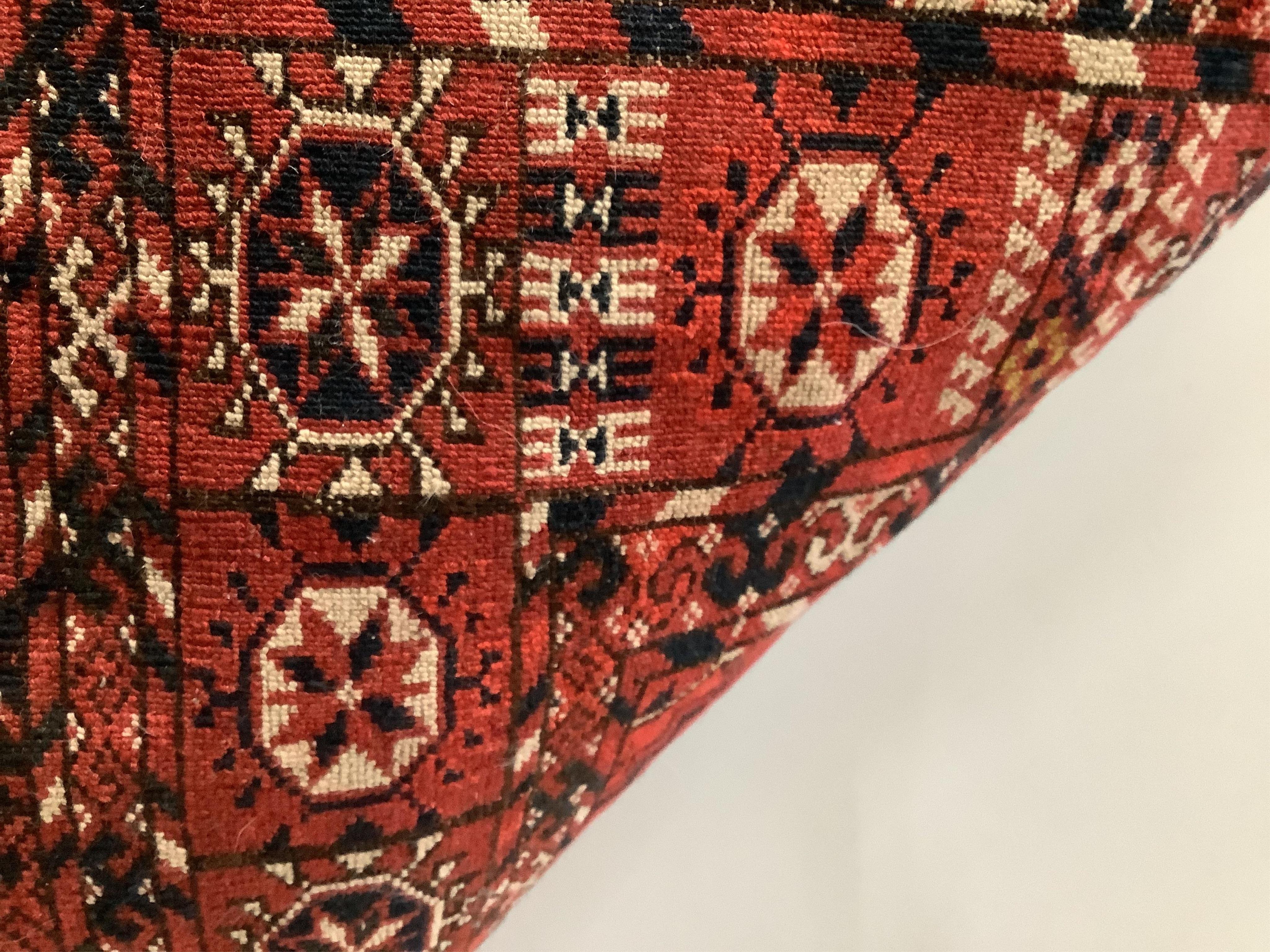 Three assorted Caucasian/ Bokhara rugs, largest 150 x 134cm. Condition - fair